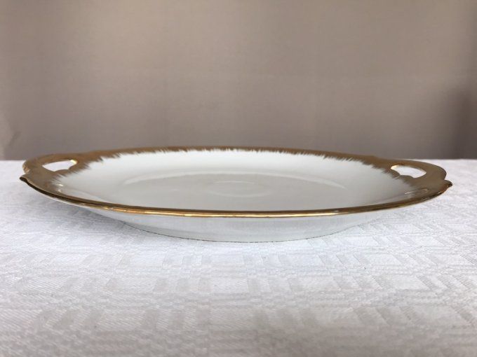 Ancien plat à gâteau en porcelaine à bordure dorée