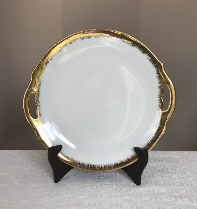 Ancien plat à gâteau en porcelaine à bordure dorée