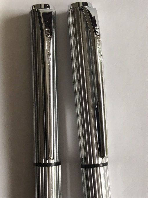 Coffret de 2 stylos S.F.R, métal argenté,  bille et mine