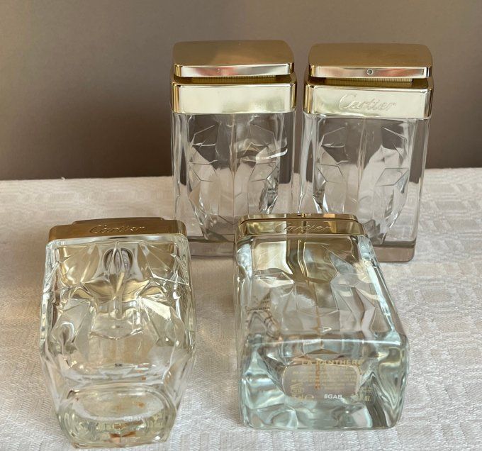Collection de 4 flacons de parfum vides, Cartier, La Panthère