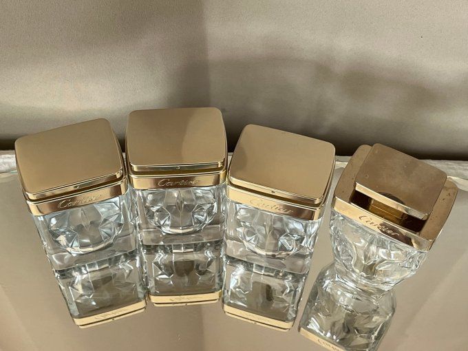 Collection de 4 flacons de parfum vides, Cartier, La Panthère