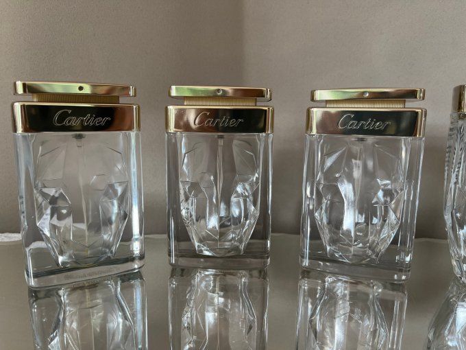Collection de 4 flacons de parfum vides, Cartier, La Panthère