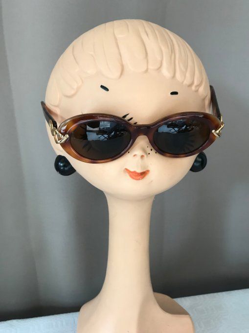 Paire de lunettes esprit vintage, monture écaille 