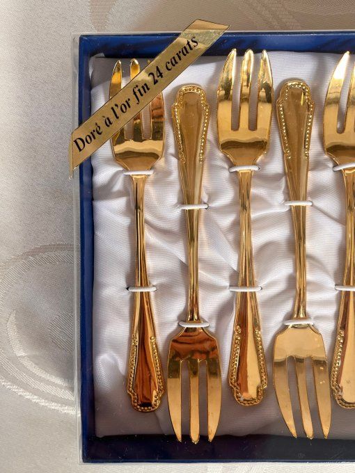 12 couverts à dessert dorés à l'or fin 24 carats neufs en boîte d'origine