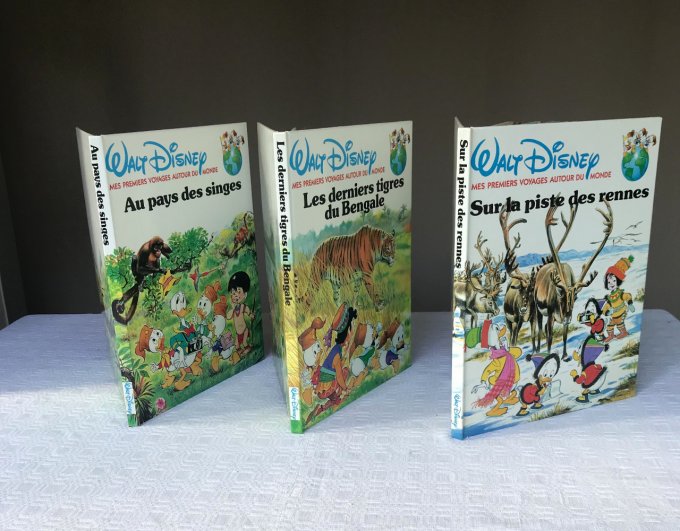 3 livres Walt disney avec vignettes autocollantes, Mes premiers voyages autour du monde, 1986