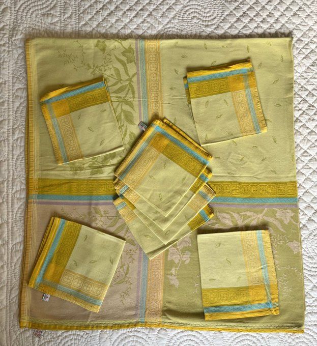 Nappe Françoise Saget et 8 serviettes, aux couleurs vert et ocre, en coton