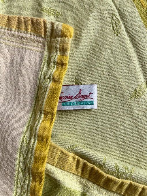 Nappe Françoise Saget et 8 serviettes, aux couleurs vert et ocre, en coton